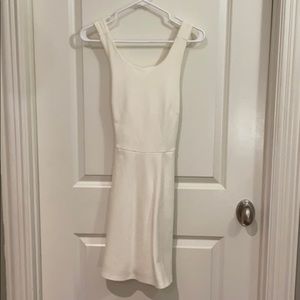 White criss cross open back mini dress w/ pockets!